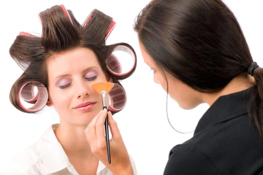 Make-up artist woman fashion model apply powder blush rouge brush