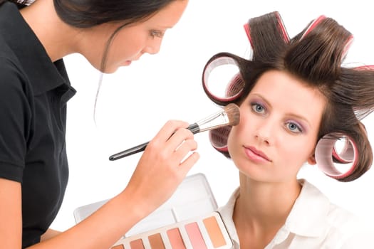 Make-up artist woman fashion model apply powder blush rouge brush