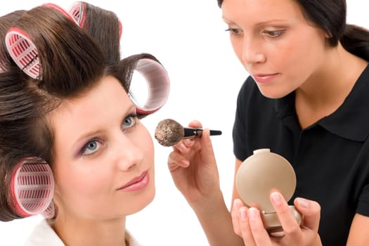 Make-up artist woman fashion model apply powder blush rouge brush