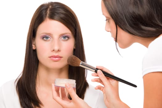 Make-up artist woman fashion model apply powder blush rouge brush
