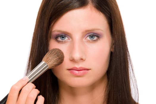 Make-up artist woman fashion model apply powder blush rouge brush