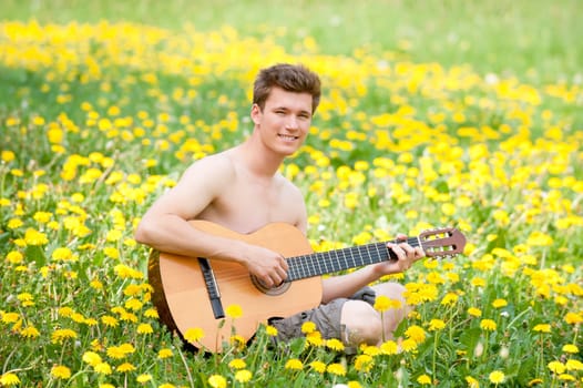 Young man with a guitar