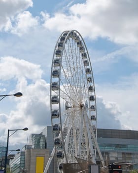 A Fairground Wheel on a city shopping plaza
