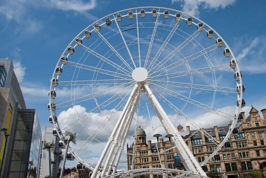 A Fairground Wheel on a city shopping plaza