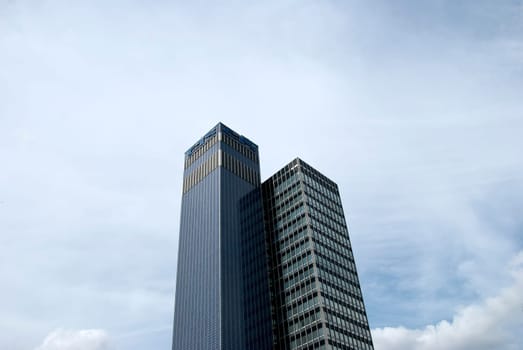 Two Skyscraper Offices under a summer sky