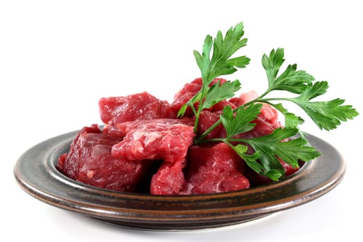 a plate of fresh,raw beef goulash