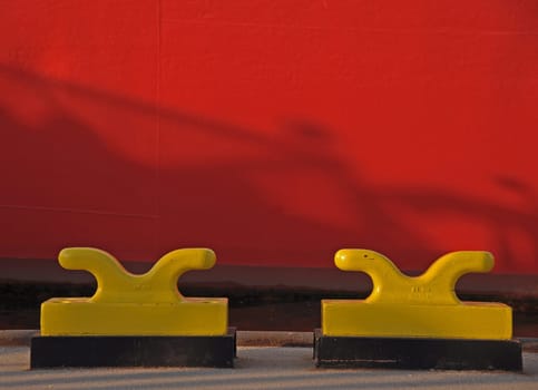 two yellow bollards