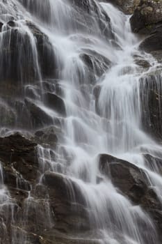 texture of flowing water on a stone mountain