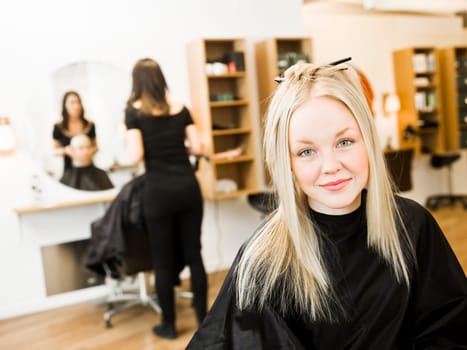 Young Blond Girl in the Hair Salon