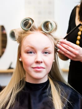 Young Blond Woman in the Hair Salon