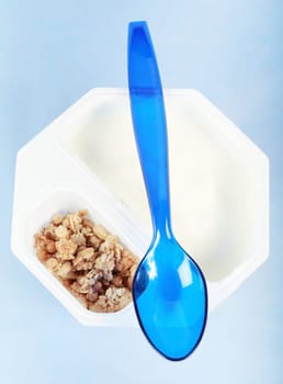 Natural white yogurt with cereals in the cup