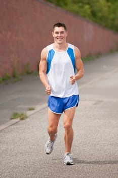 Young man doing running training