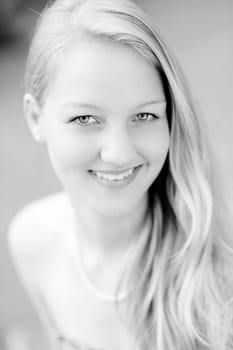 Portrait of a young and smiling woman