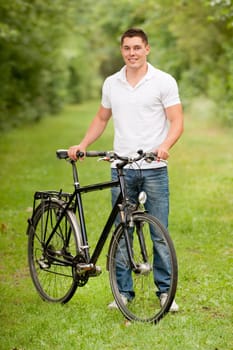 Young man with a bicycle
