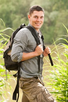 Young hiker at a lake