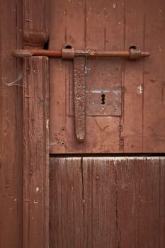 Antique wooden door on an old house