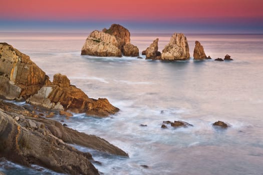 Amazing seascape sunrise at winter. Los Urros, Spain