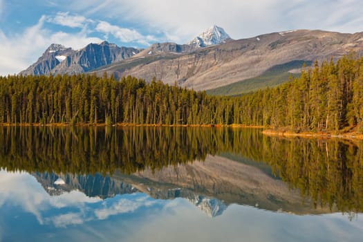 Reflections of Mount Fryatt and Whirlpool Peak over Leach Lake, Jasper National Park, Alberta, Canada