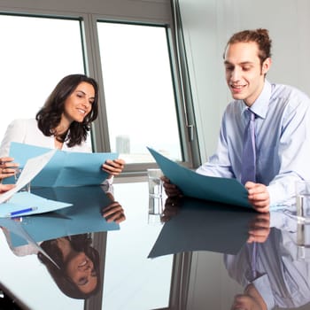 Female boss with intern in beautiful office