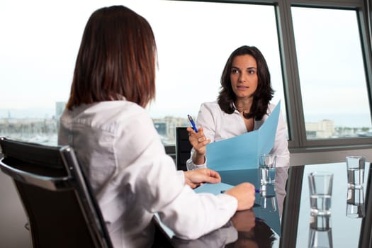 Two businesswomen in beautiful office