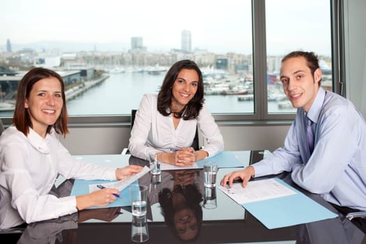 Three business people in the office