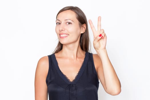 Woman makes the Victory sign