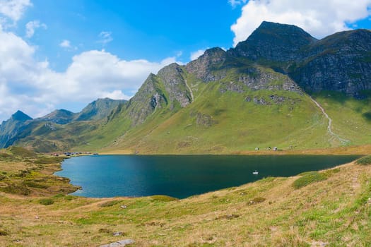 Lake Cadagno in the shadow of the clouds