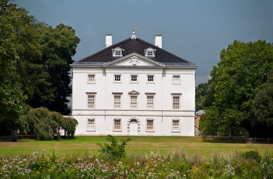 White house in a park, England