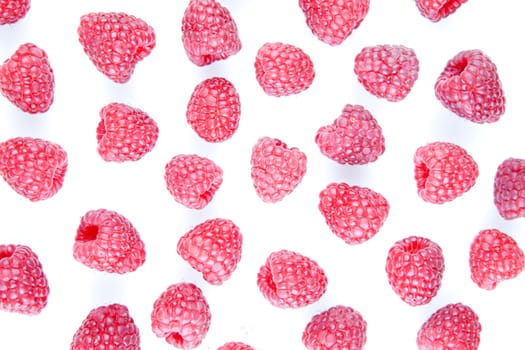 Fresh raspberries scattering on a white background