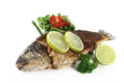 fried trout with salad and parsley