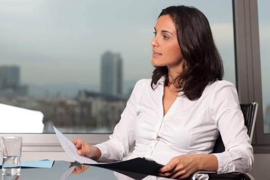 Beautiful businesswoman in office