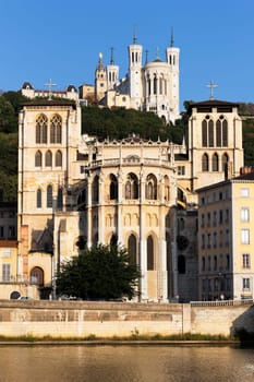 The apse of the Saint Jean cathedral, next to the Saone river, is dominated by the Fourviere basilica.