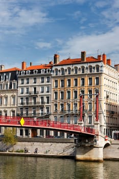 Lyon city with red footbridge in summer