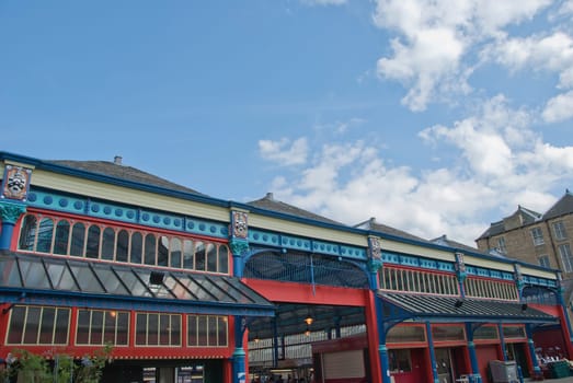 The Ornate Brightly Coloured Cast Iron Facade of a Victorian Era Market Hall