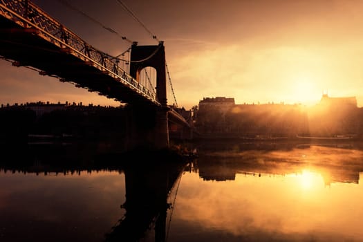 sunset and footbridge in Lyon city in France