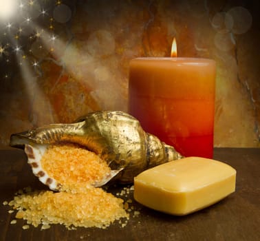 Soap and  flowers on wooden table
