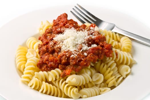pasta with bolognese sauce with tomatoes, meat and parmesan cheese