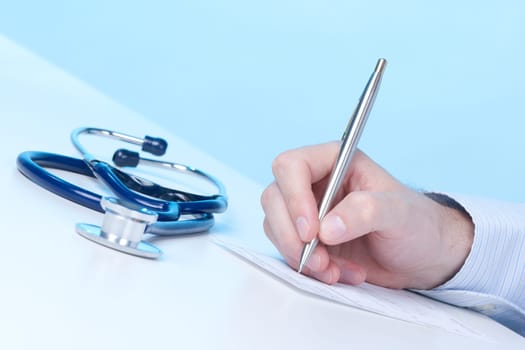 Family doctor write prescription (recipe)
