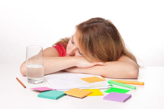 Tired college student is having a rest during studying (swot up) for exam
