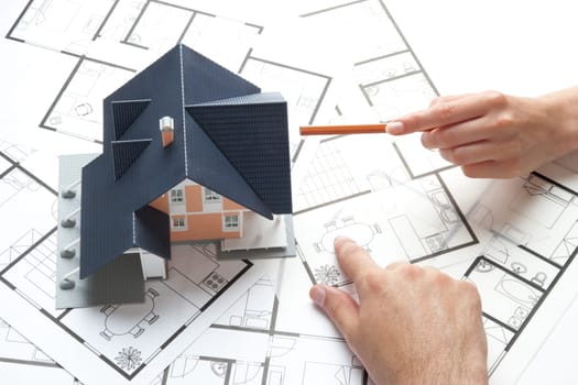 Young pair planning living together in new house (marital domicile)