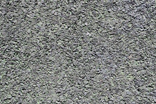 Rubberized floor texture. A type of sustainable flooring that can be produced from recycled tires.