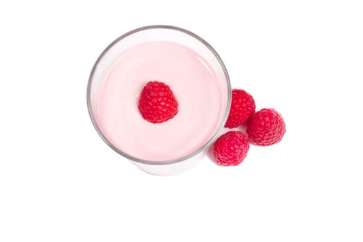 Raspberry on milkshake with raspberries from above on white background