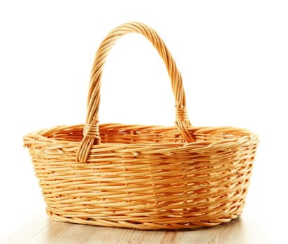 Empty wicker basket isolated on white