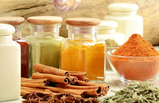 Composition with variety of spices on kitchen table