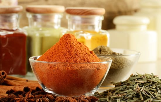 Composition with variety of spices on kitchen table
