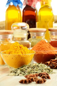 Composition with variety of spices on kitchen table