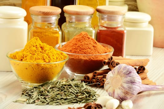 Composition with variety of spices on kitchen table