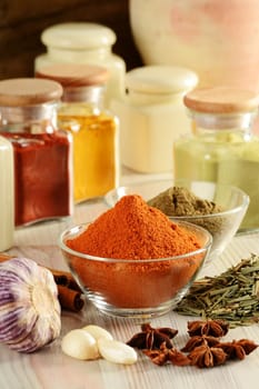 Composition with variety of spices on kitchen table