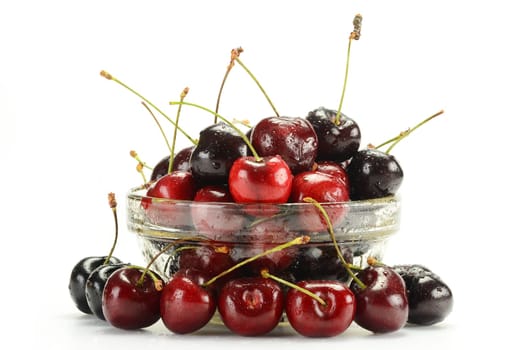 Composition with fresh cherries isolated on white