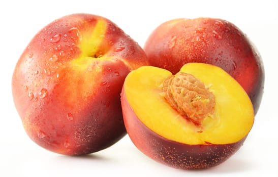 Fresh ripe peaches isolated on white
